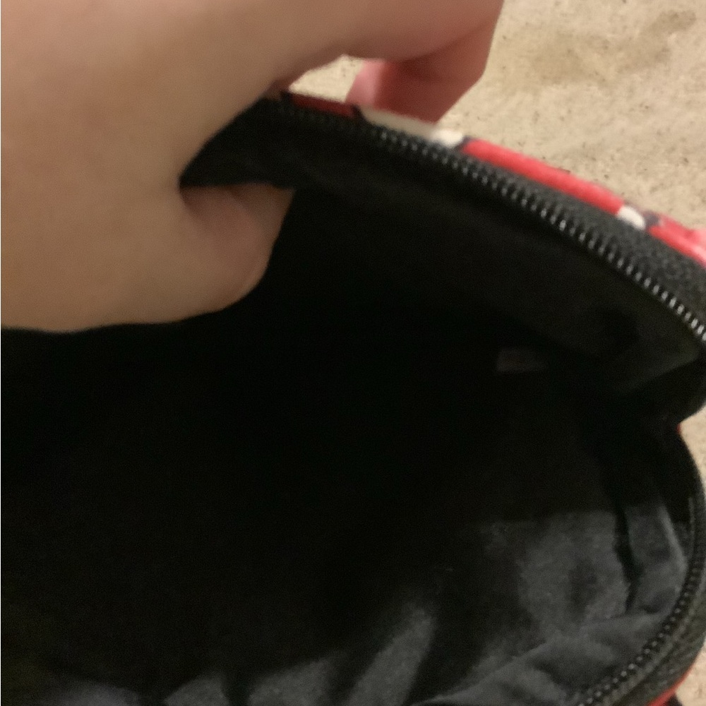 Vera Bradley  red and black purse with penguins on it